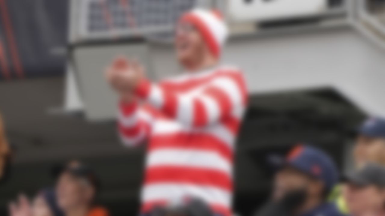 Fans in costume during an NFL football game between San Francisco 49ers and Chicago Bears on Sunday, October 31, 2021 in Chicago, Illinois.