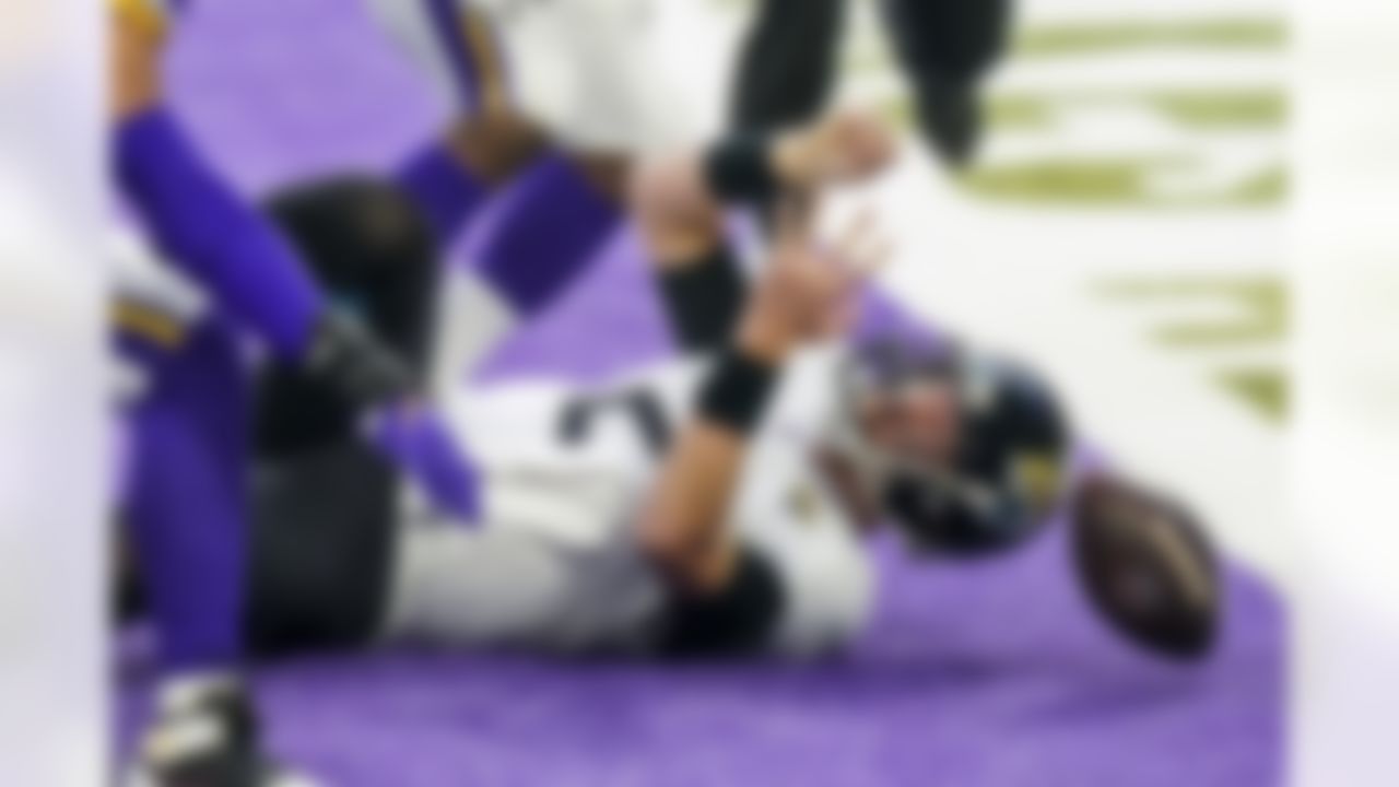 Jaguars quarterback Mike Glennon is sacked for a safety in the fourth quarter against the Minnesota Vikings. Jacksonville lost in overtime, 27-24.