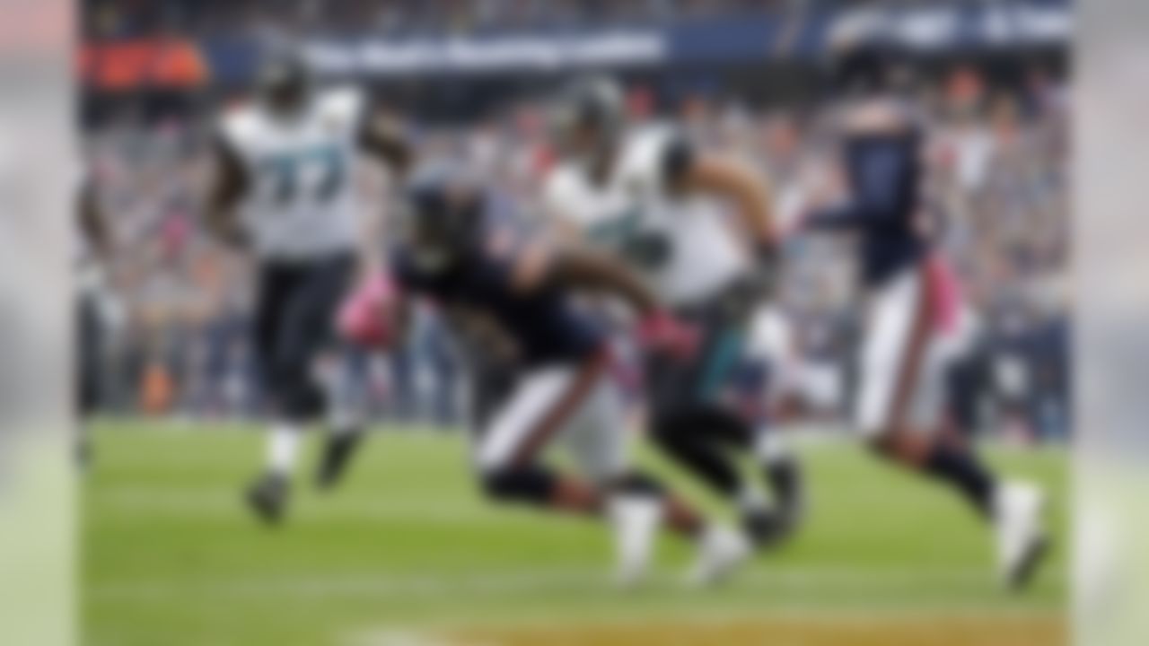 Chicago Bears cornerback Tracy Porter (21) runs out of the end zone after an interception during the first half of an NFL football game against the Jacksonville Jaguars in Chicago, Sunday, Oct. 16, 2016. (AP Photo/Jeff Roberson)