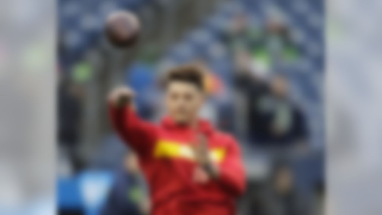 Kansas City Chiefs quarterback Patrick Mahomes passes during warmups before an NFL football game against the Seattle Seahawks, Sunday, Dec. 23, 2018, in Seattle. (AP Photo/Stephen Brashear)