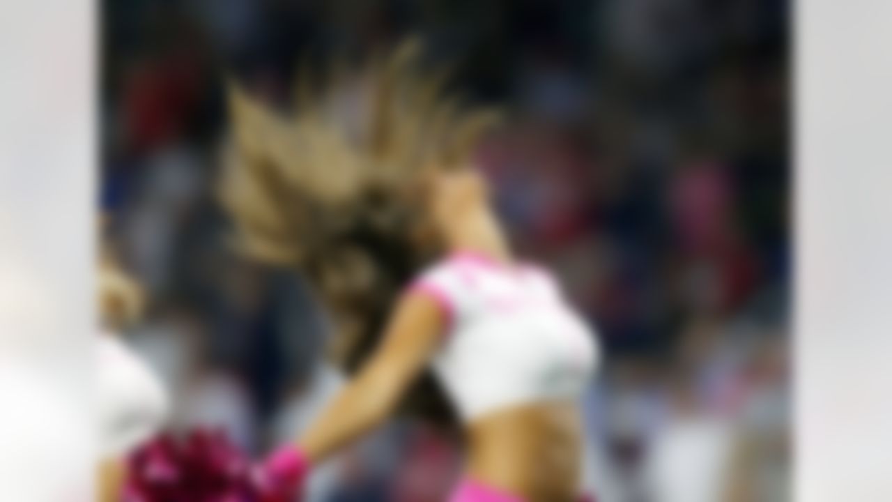 A Houston Texans cheerleader performs during an NFL football game against the Indianapolis Colts at NRG Stadium on Thursday, October 9, 2014 in Houston, Texas.  (Aaron M. Sprecher/NFL)