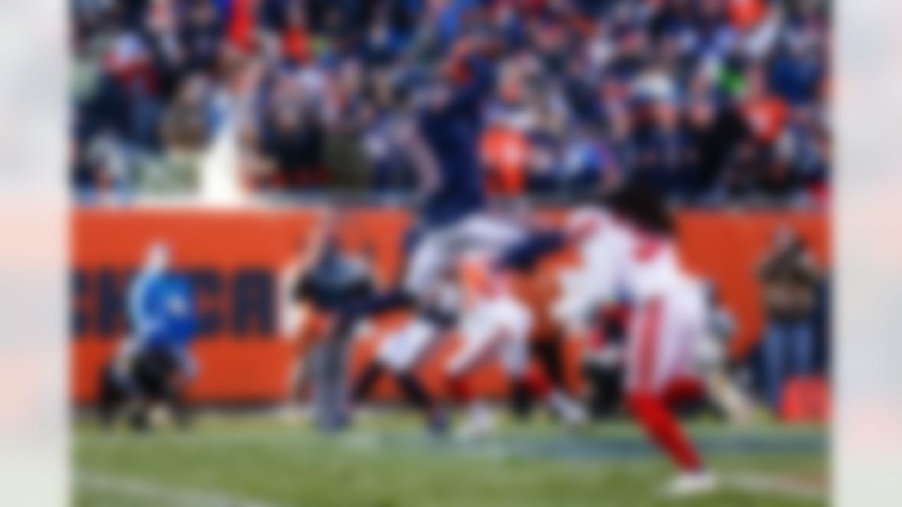 Chicago Bears wide receiver Darnell Mooney (11) scores a touchdown during an NFL football game against the New York Giants on Sunday, January 2, 2022 in Chicago, Illinois.