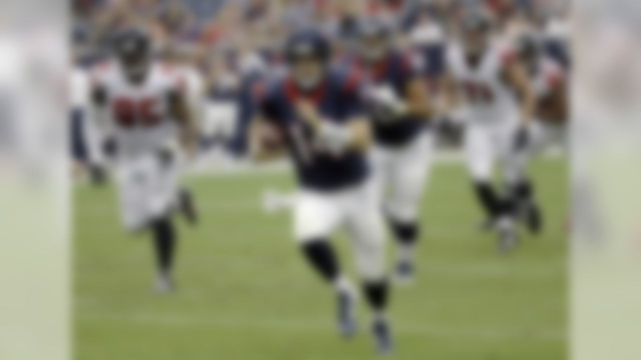 Houston Texans' Ryan Fitzpatrick (14) scrambles against the Atlanta Falcons during the first quarter of an NFL preseason football game Saturday, Aug. 16, 2014, in Houston. (AP Photo/David J. Phillip)