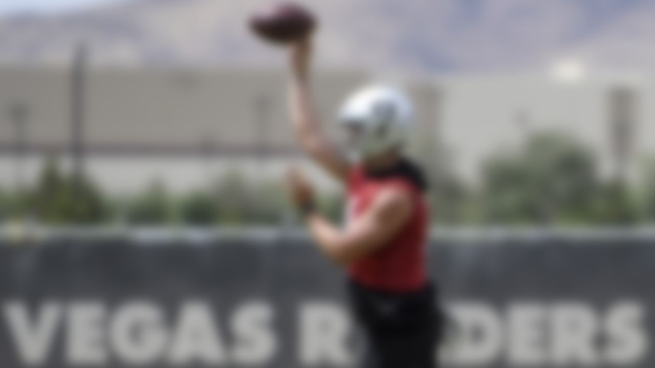 Las Vegas Raiders quarterback Derek Carr passes during an NFL football organized team activity at the team's training facility Wednesday, May 26, 2021, in Henderson, Nev.