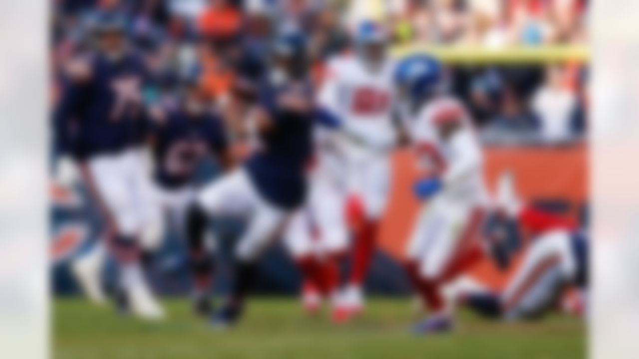 Chicago Bears wide receiver Allen Robinson (12) runs the ball during an NFL football game against the New York Giants on Sunday, January 2, 2022 in Chicago, Illinois.