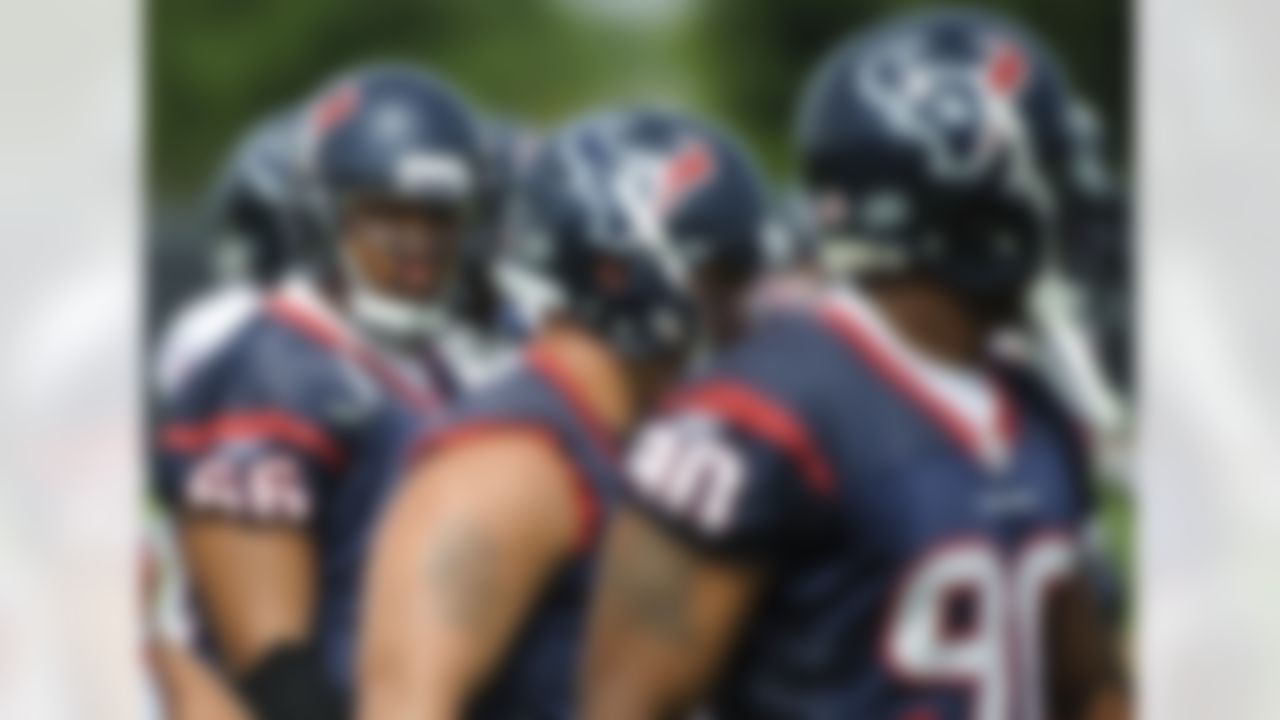Houston Texans' defensive lineman DelJuan Robinson (66) gets ready for drills during an NFL football mini camp Tuesday, May 18, 2010, in Houston. (AP Photo/Dave Einsel)