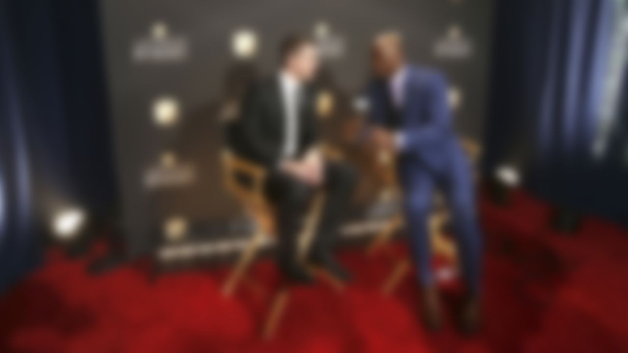 Green Bay Packers quarterback Aaron Rodgers (left) talks with NFL Network's Akbar Gbaja-Biamila backstage after during the 4th Annual NFL Honors awards show at the Phoenix Symphony Hall on Saturday, January 31, 2015 in Phoenix, AZ.