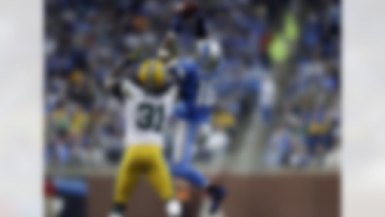 Detroit Lions wide receiver Titus Young (16) goes up for a pass as Green Bay Packers cornerback Davon House (31) defends in the third quarter of their NFL football game in Detroit, Sunday, Nov. 18, 2012. (AP Photo/Paul Sancya)