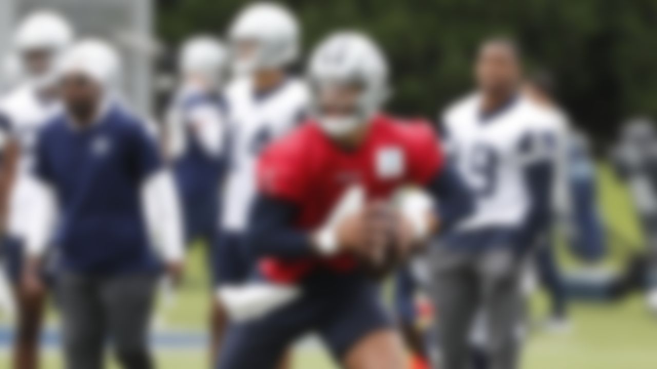 Dallas Cowboys quarterback Dak Prescott (4) rolls out during an NFL football organized team activity at the team's training facility Tuesday, June 1, 2021 in Frisco, Texas.