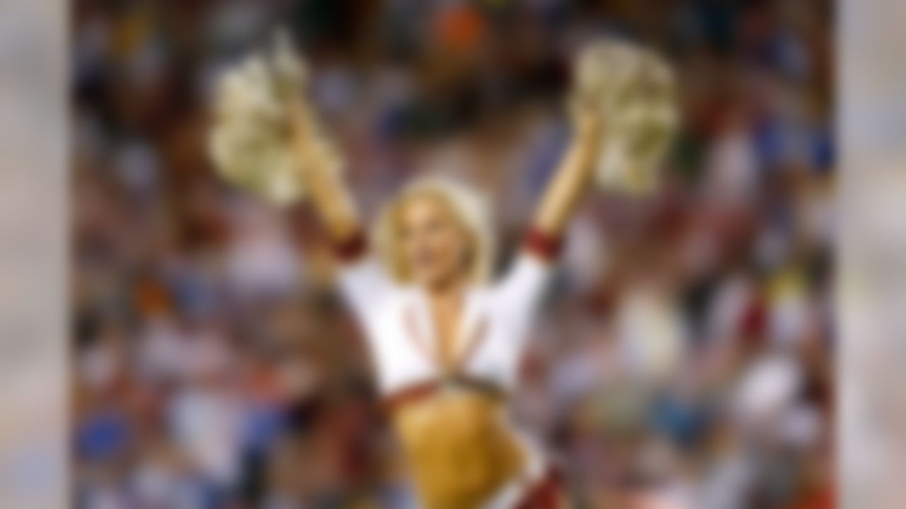A Washington Redskins cheerleader performs during an NFL football game against the New York Giants at FedEx Field on Thursday, September 25, 2014 in Landover, Maryland. (Aaron M. Sprecher/NFL)