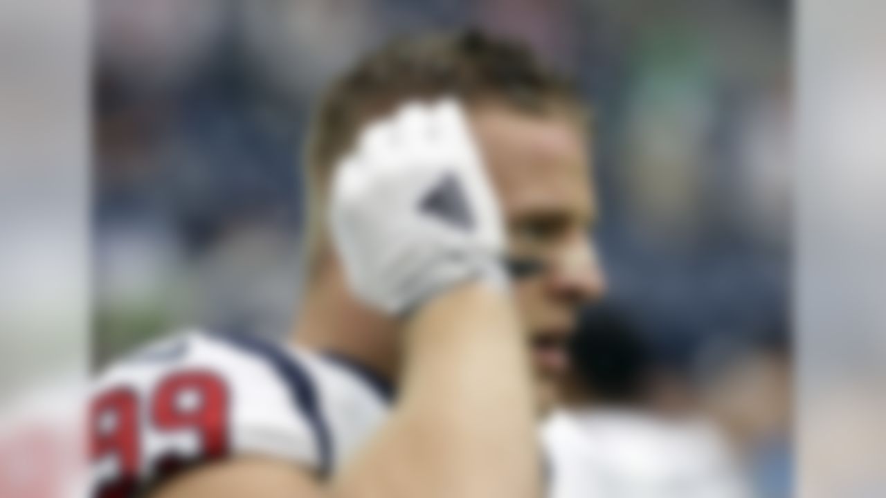 Houston Texans' J.J. Watt warms up before an NFL football game against the Kansas City Chiefs, Sunday, Sept. 13, 2015, in Houston. (AP Photo/David J. Phillip)