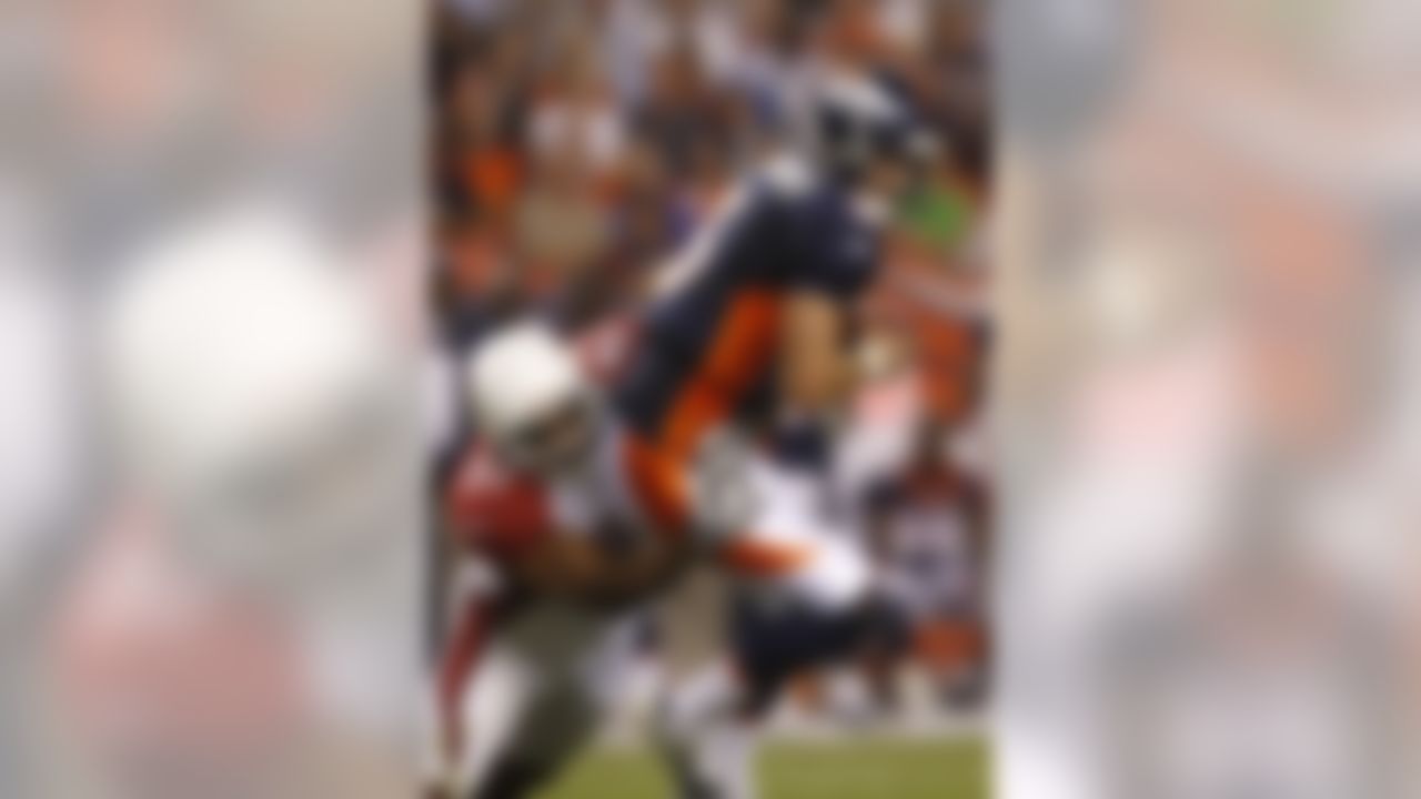 Denver Broncos quarterback Tom Brandstater (3) is sacked by Arizona Cardinals linebacker Victor Hobson during the second half of an NFL preseason football game in Denver on Thursday, Sept. 3, 2009. (AP Photo/ David Zalubowski )