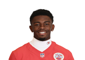 Kansas City Chiefs wide receiver Justyn Ross shoves defensive back