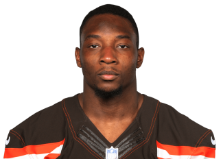 Cleveland Browns strong safety Derrick Kindred (26) trips up