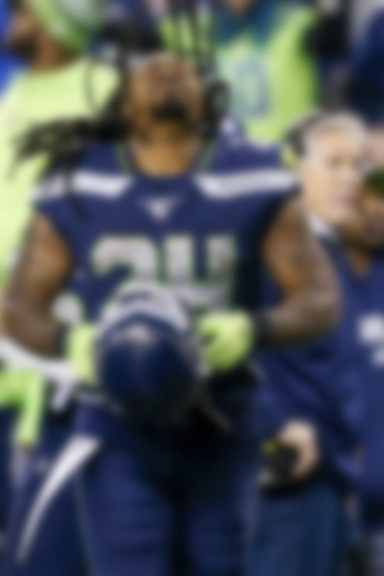 Dec 29, 2019; Seattle, Washington, USA; Seattle Seahawks running back Marshawn Lynch (24) puts on his helmet during the fourth quarter against the San Francisco 49ers at CenturyLink Field. Mandatory Credit: Joe Nicholson-USA TODAY Sports