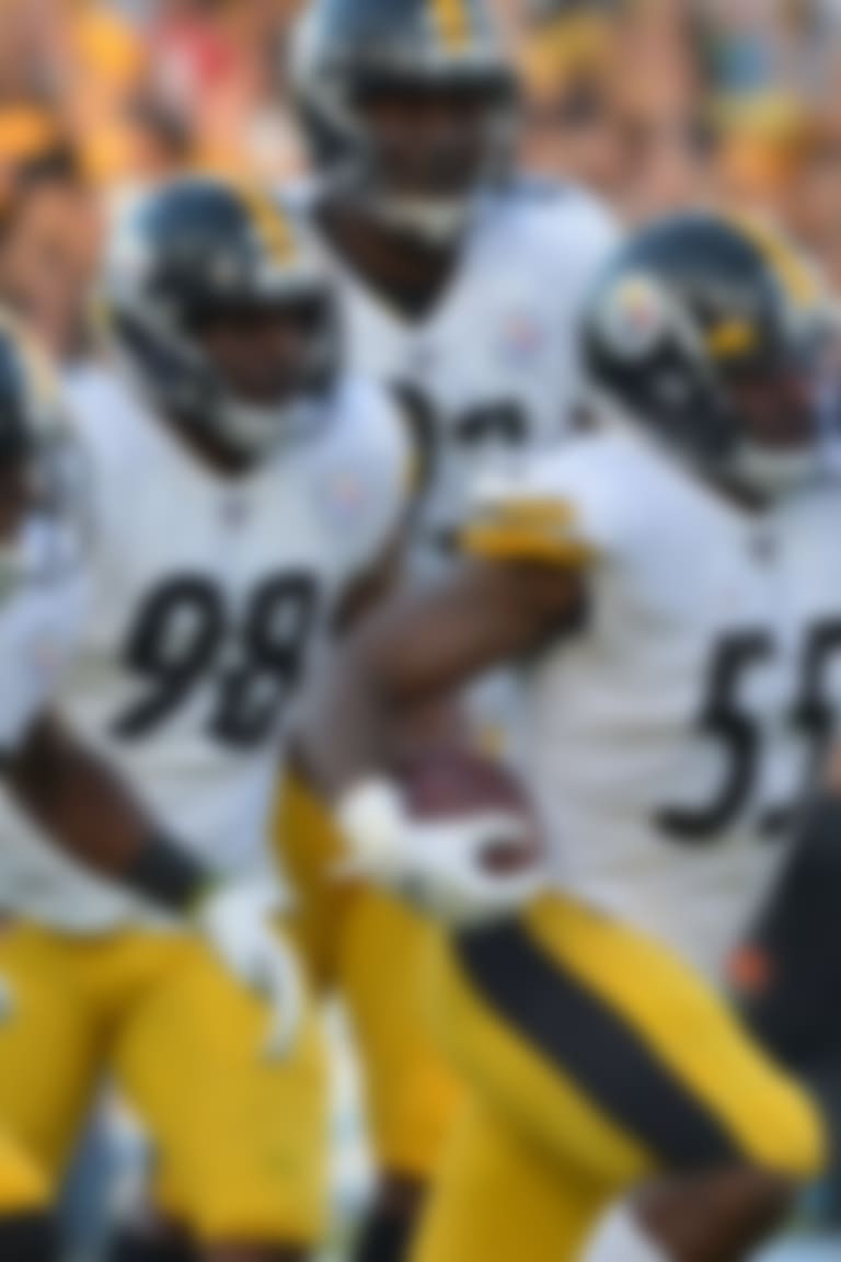 Oct 13, 2019; Carson, CA, USA; Pittsburgh Steelers linebacker Devin Bush (55) celebrates a first quarter interception with teammates during the first quarter as Los Angeles Chargers quarterback Philip Rivers (right, background) reacts at Dignity Health Sports Park. Mandatory Credit: Jake Roth-USA TODAY Sports