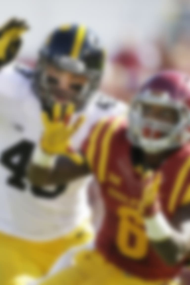 Iowa State running back Tyler Brown makes a reception in front of Iowa linebacker Josey Jewell, left, during the first half of an NCAA college football game, Saturday, Sept. 12, 2015, in Ames, Iowa. (AP Photo/Charlie Neibergall)