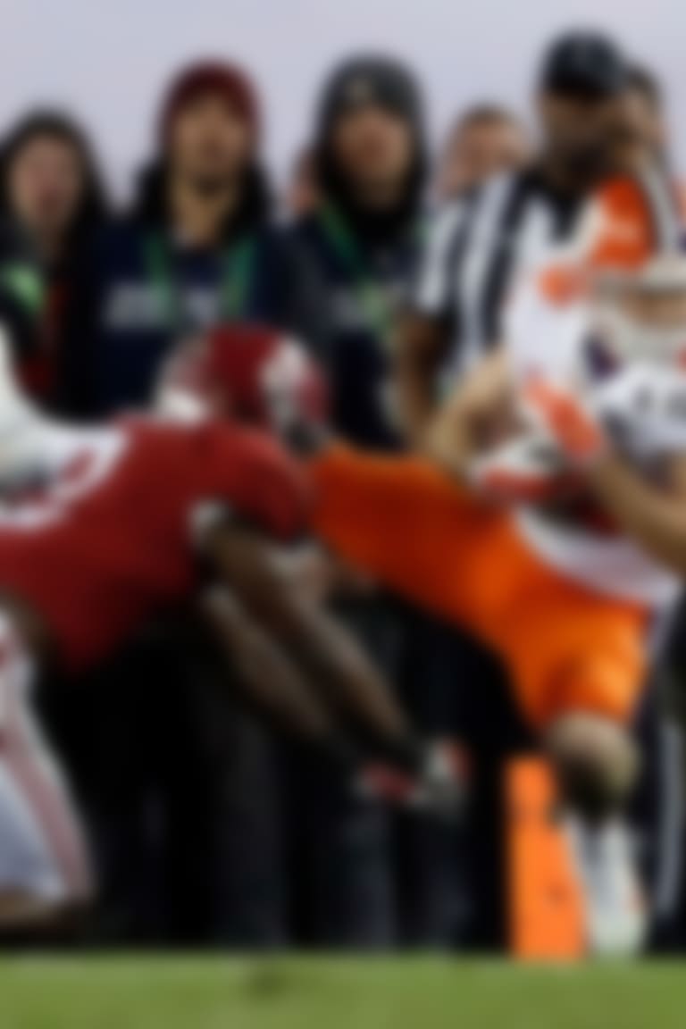 FILE- In this Jan. 10, 2017, file photo, Clemson's Hunter Renfrow, right, catches a touchdown pass in front of Alabama's Tony Brown during the second half of the NCAA college football playoff championship game in Tampa, Fla. Renfrow, a former walk-on, made the catch with 1 second left that gave Clemson a win over Alabama in the College Football Playoff championship game. (AP Photo/John Bazemore, File)