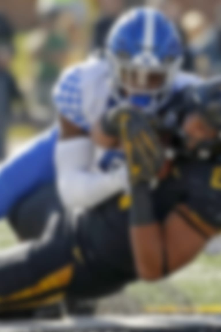 Missouri tight end Albert Okwuegbunam (81) is tackled by Kentucky cornerback Lonnie Johnson Jr. (6) during the first half of an NCAA college football game Saturday, Oct. 27, 2018, in Columbia, Mo. (AP Photo/Charlie Riedel)