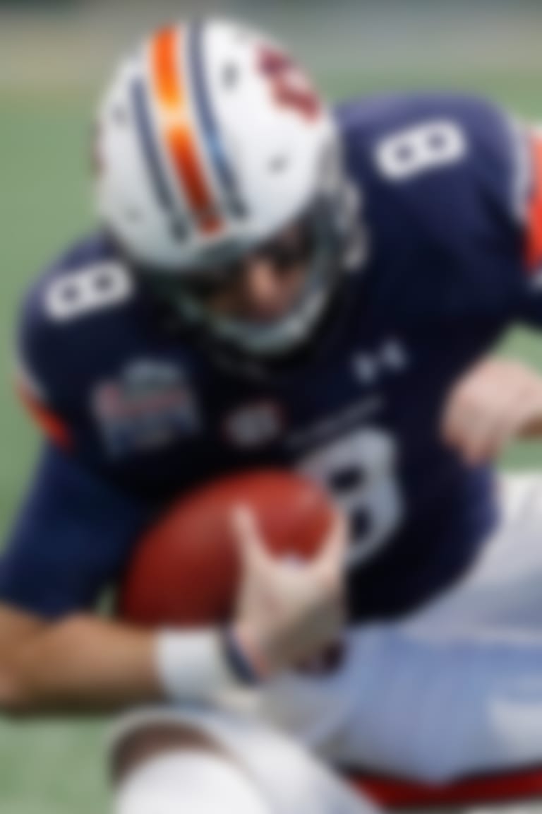 Central Florida linebacker Shaquem Griffin (18) sacks Auburn quarterback Jarrett Stidham (8) during the second half of the Peach Bowl NCAA college football game, Monday, Jan. 1, 2018, in Atlanta. (AP Photo/John Bazemore)