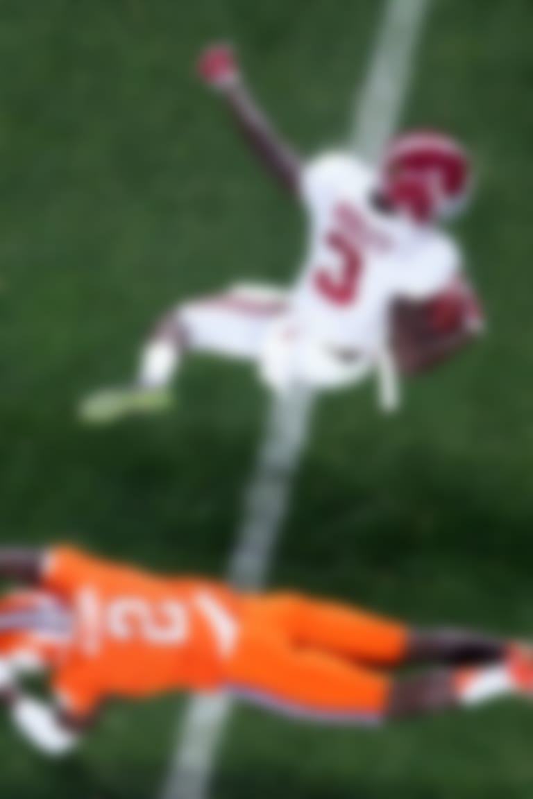 Jan 11, 2016; Glendale, AZ, USA; Alabama Crimson Tide wide receiver Calvin Ridley (3) jumps over Clemson Tigers cornerback Mackensie Alexander (2) during the first half in the 2016 CFP National Championship at University of Phoenix Stadium. Mandatory Credit: Erich Schlegel-USA TODAY Sports