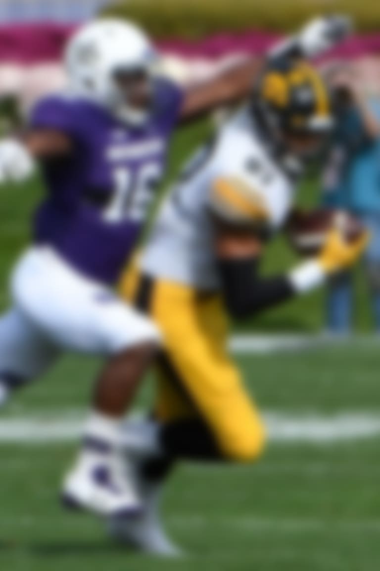 Oct 21, 2017; Evanston, IL, USA; Iowa Hawkeyes tight end Noah Fant (87) catches a pass in front of Northwestern Wildcats safety Godwin Igwebuike (16) during the first half at Ryan Field. Mandatory Credit: David Banks-USA TODAY Sports