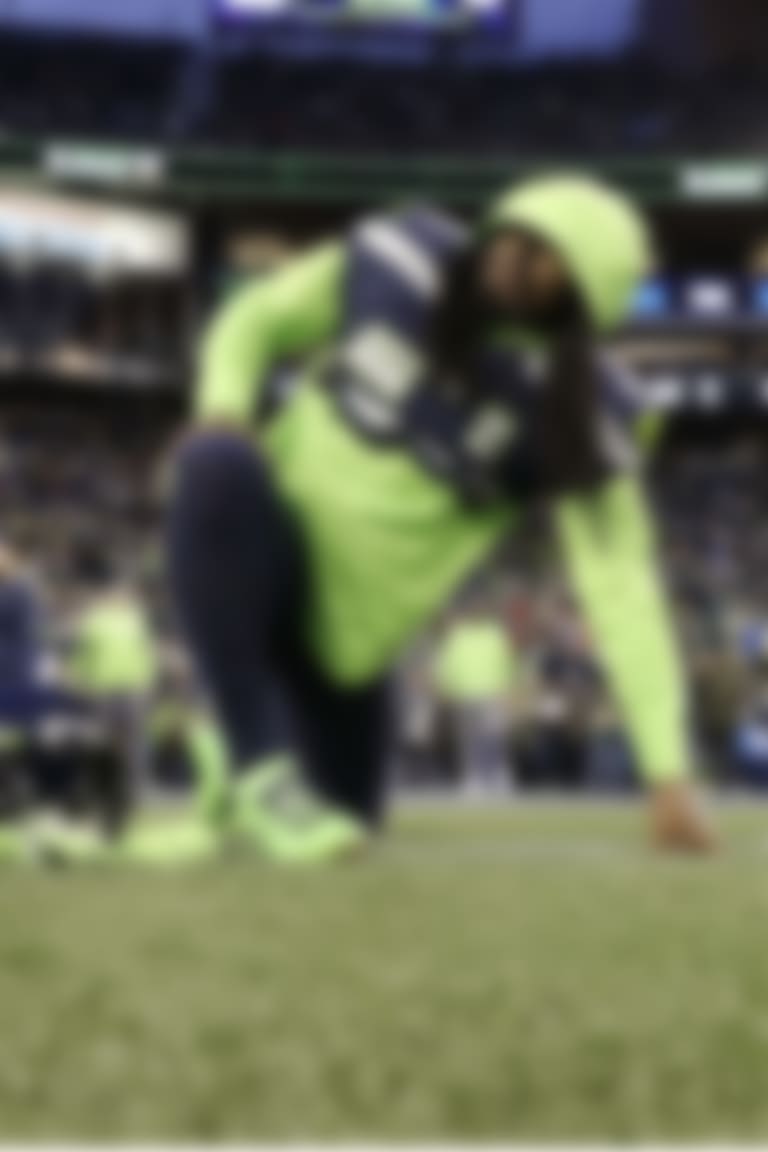 Seattle Seahawks running back Marshawn Lynch stretches on the field before an NFL football game against the San Francisco 49ers, Sunday, Dec. 29, 2019, in Seattle. (AP Photo/Ted S. Warren)
