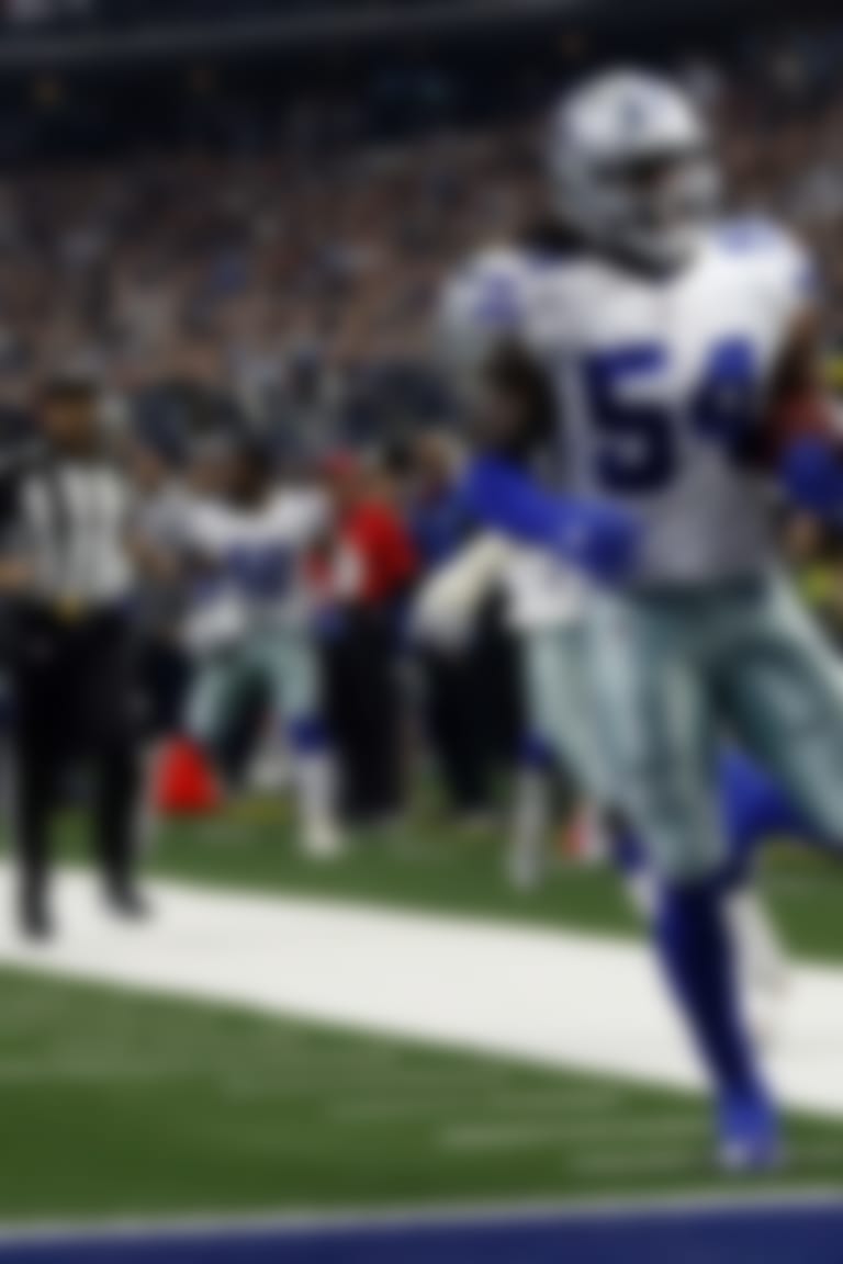 Tampa Bay Buccaneers quarterback Jameis Winston, left on field, looks on as Dallas Cowboys linebacker Jaylon Smith (54) scores a touchdown after recovering a Winston fumble in the first half of an NFL football game in Arlington, Texas, Sunday, Dec. 23, 2018. (AP Photo/Ron Jenkins)