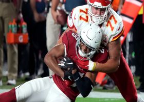 Buechele's pass is picked by Charles Washington after WR falls down