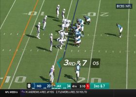 Samson Ebukam sprints into the backfield to drag down Lawrence for 17-yard sack