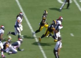 Big Ben coughs up the football on strip-sack by Reed