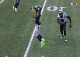 Lockett's brief levitation ends with toe-tapping landing for 17-yard pickup
