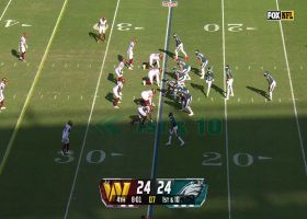 Jalen Hurts' Houdini act nets 24 yards and a first down
