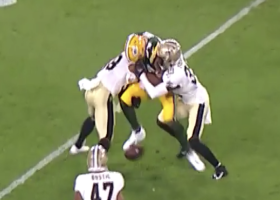 Saints jump on the football after Tyler Davis coughs it up