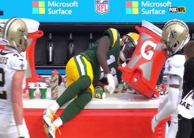 Jayden Reed knocks over Gatorade cooler on sideline after near-toe-tap catch