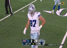 Jake Ferguson gets his personal towel ripped by Pats defender on 4-yard catch