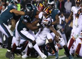 Brian Robinson's second burst moves slew of Eagles along with him on 12-yard carry