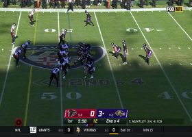 Gus Edwards quickly shows his stiff-arm strength to Jaylinn Hawkins on 11-yard rush
