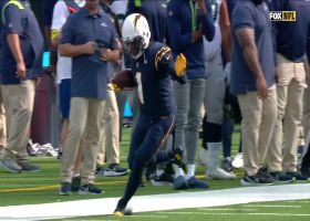 Herbert zips 22-yard laser to DeAndre Carter while on the run