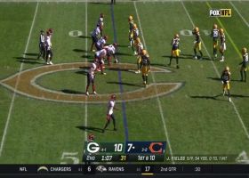 Justin Fields fits pass into Marquise Goodwin's hands for 12 yards