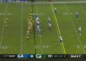 Rodgers buys time to throw to Marcedes Lewis for 14-yard gain