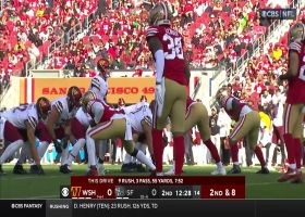 Heinicke lofts 25-yard pass on the run to Dotson just behind 49ers LB