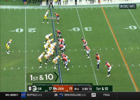 AJ Dillon's wicked stiff-arm sends Cooper directly into the grass