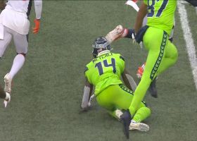 Randy Gregory dislodges ball from DK Metcalf's clutches for Broncos turnover