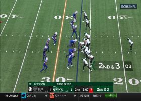 Michael Carter takes pitch down left sideline for 25-yard pickup