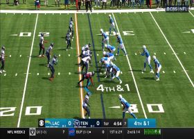 Mike Williams eludes Titans defender to convert fourth down via 20-yard catch and run
