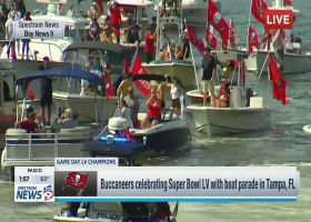 Scotty Miller drops Godwin's phone into the water during boat parade