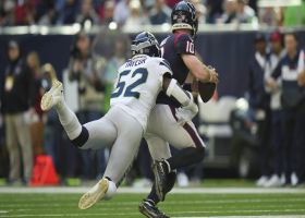 Darrell Taylor races around the edge for sack on Mills