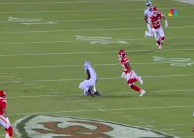 Amon-Ra St. Brown secures Goff's 18-yard throw on play action