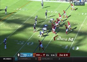 Wentz flicks it to McKissic to save potential sack